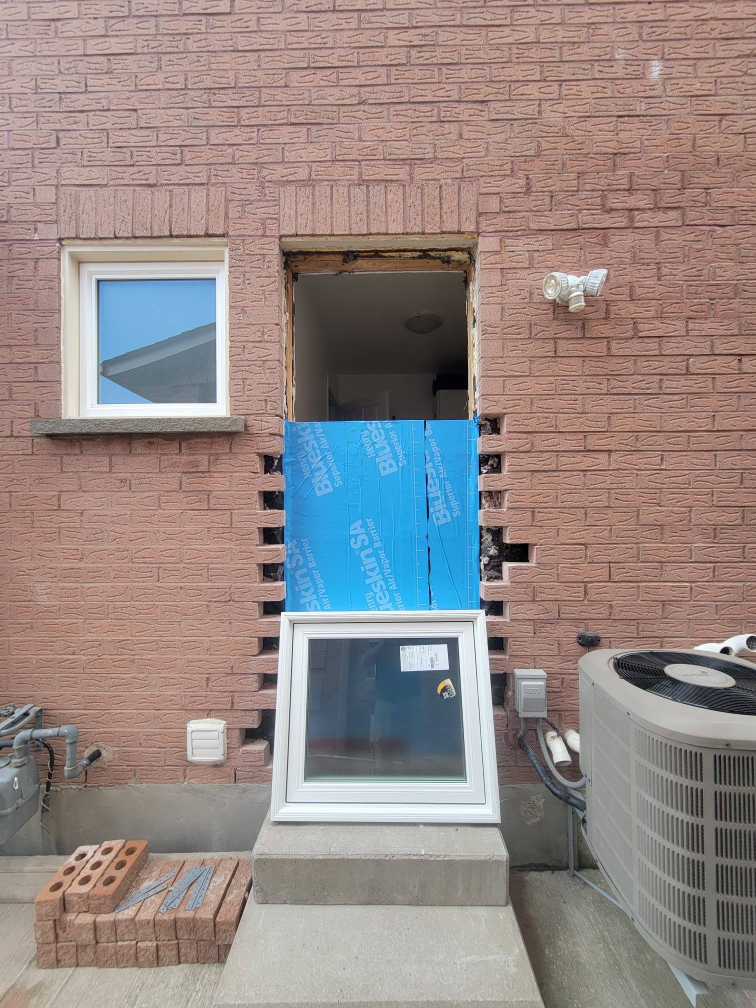 Side Door Closure and New Window in Toronto: Glencairn Ave, photo 2